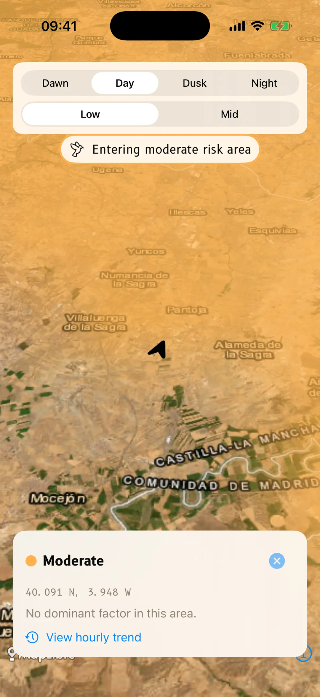 BirdRisk on a satellite map: tapping a moderate-risk zone opens a panel with the risk level, coordinates, dominant factor and a 'View hourly trend' link